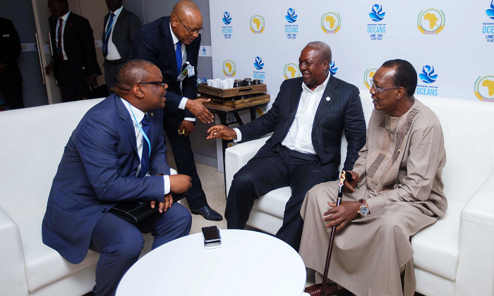 President Mahama with his Chadian counterpart and Chairman of the AU, Mr Idriss Deby, and Mr Emmanuel Bombande, prior to the General Assembly meeting